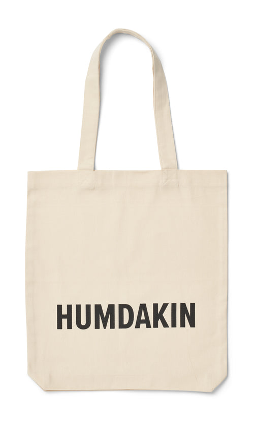 HUMDAKIN Liten handleveske 216 Merkehistorie